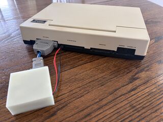 Tandy 200 connected to Zimodem module via a DB9 to 25 pin serial adapter